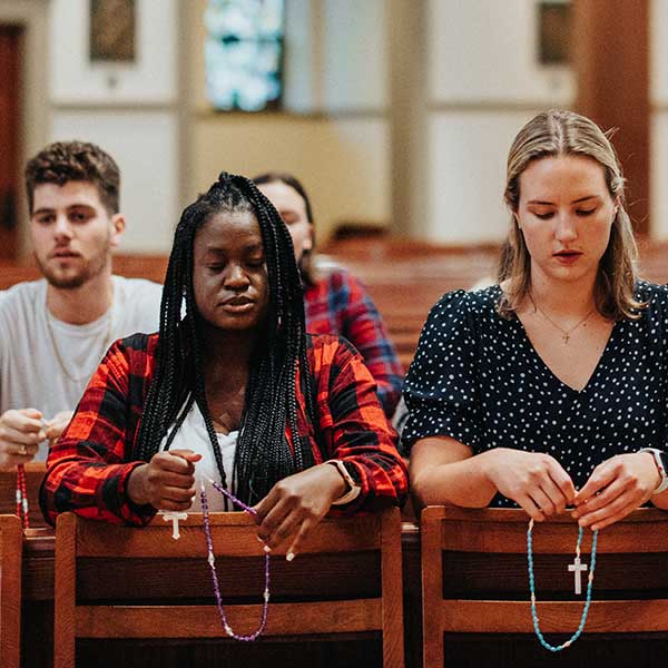students at prayer